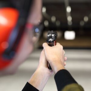 img of someone shooting a gun