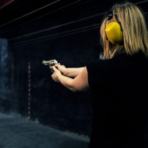 img of someone shooting a gun