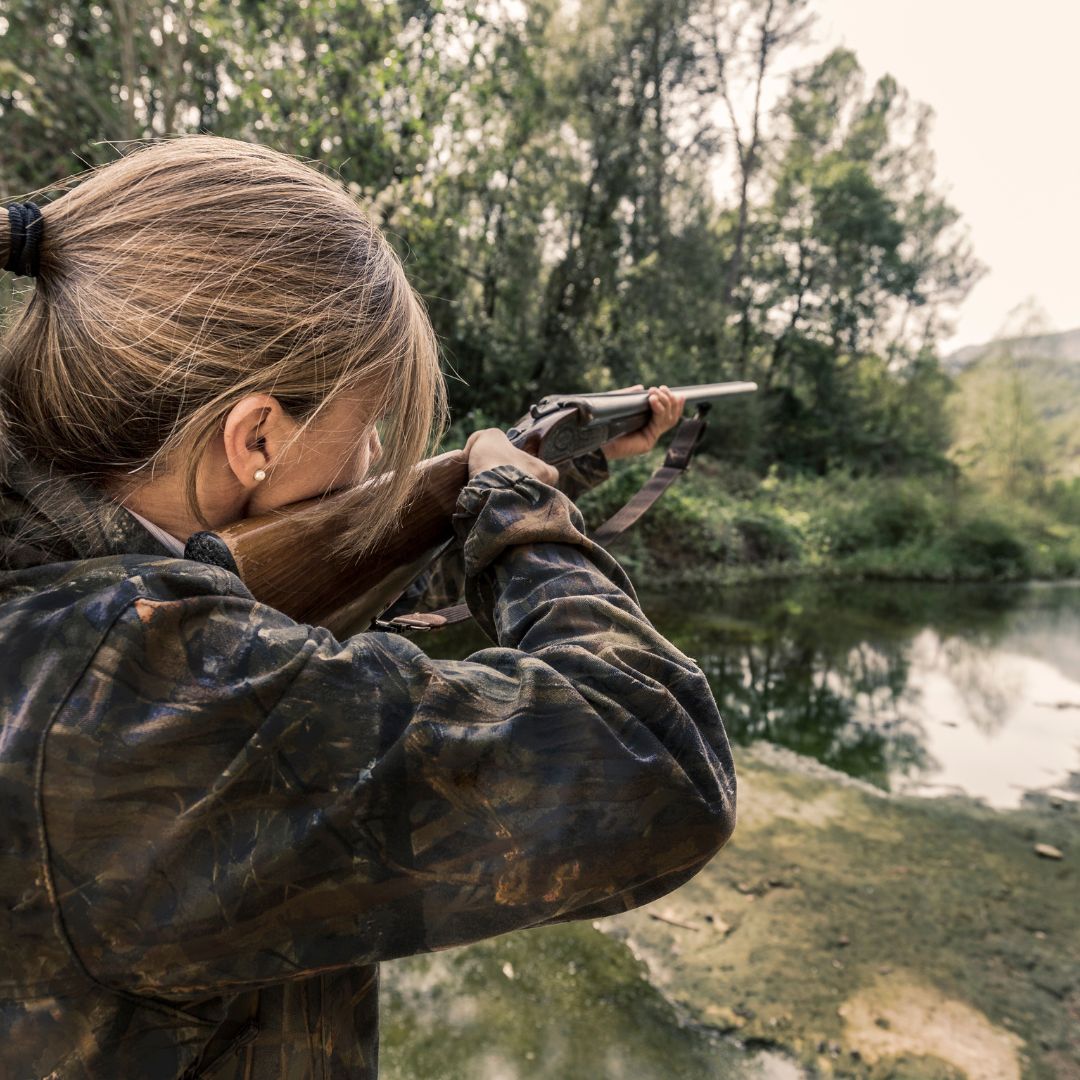 woman shooting rifle