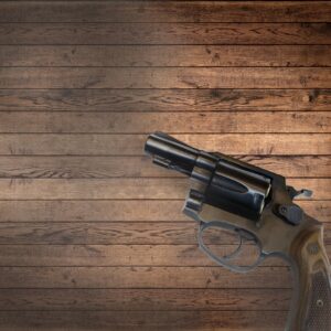 Revolver on wood